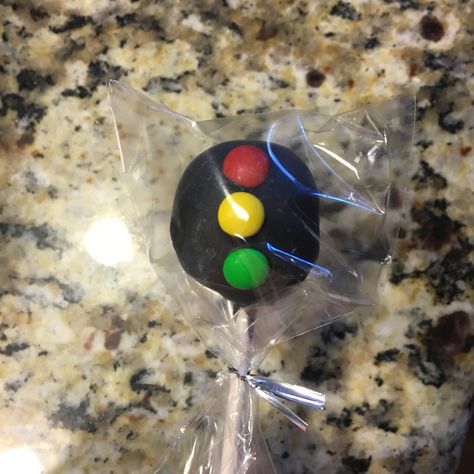 Stop light cake pops for a race car birthday party. Mini m&m lights Race Car Cakepops, Two Fast Cake Pops, Race Car Themed Cake Pops, Racing Cake Pops, Race Car Cake Pops Birthday, Car Cake Pops Ideas, Race Car Theme Chocolate Covered Pretzels, Racing Theme Cake Pops, Race Car Cake Pops