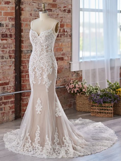 Bring your fairytale to life in the Sebastiane dress - a romantic lace fit-and-flare bridal dress for classic vibes. Shop Maggie Sottero today. #maggiesottero #sotteroandmidgley #rebeccaingram #maggiesotteroweddingdress #wedding #weddingdress #bridalgown #weddinggown #engaged #weddingideas #weddingplanning #sayyestothedress #bride #bridetobe #laceweddingdress #fitandflareweddingdress Dress On Mannequin, Bridal Closet, Sottero And Midgley Wedding Dresses, Sottero Midgley, Short Engagement, Sottero And Midgley, Blush Gown, Ivory Gown, Maggie Sottero Wedding Dresses