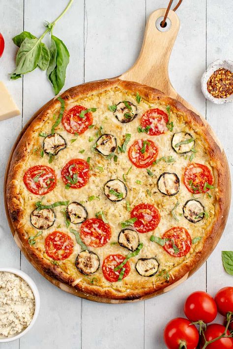 Learn how to make a delicious vegan white pizza with zucchini and tomatoes. It's simple to make, loaded with flavor, and can be made on either the grill or in the oven. #vegan #pizza #whitepizza #sweetsimplevegan #grilled #veganfood #entree Vegan White Pizza, Pizza Blanca, Zucchini And Tomatoes, Tofu Ricotta, Vegan Ricotta, Zucchini Tomato, Best Homemade Pizza, Vegan Mozzarella, White Pizza