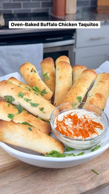 Taylor Jackzen on Instagram: "OVEN-BAKED BUFFALO CHICKEN TAQUITOS | bring this easy finger food appetizer to your next party and everyone will love you for it! ✨ Recipe below ⬇️ Ingredients: For the Buffalo Chicken Filling: 3 cups shredded cooked chicken (rotisserie chicken works well) 1/2 cup buffalo sauce (adjust to your preferred spice level) 1/2 cup cream cheese, softened 1/2 cup Mexican melting cheese 1/4 cup chopped onions 1/4 cup chopped celery 1/4 cup cilantro Salt and black pepper to taste For the Taquitos: 8-10 small flour tortillas Cooking spray (olive oil or non-stick spray) Fresh cilantro (optional, garnish) Ranch dressing for dipping (optional) Instructions: Preheat your oven to 425°F (220°C). Line a baking sheet with parchment paper or lightly grease it. In a large m Mexican Melting Cheese, Tortilla Roll Up, Buffalo Chicken Taquitos, Shredded Cooked Chicken, Easy Finger Food, Chicken Rotisserie, Melting Cheese, Baked Buffalo Chicken, Chicken Taquitos