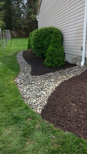 Dry river rock bed,done by me 5:9:2014 Rock Drip Edge Around House, River Rock And Mulch Landscaping, Rock Drainage, Rocks Design, River Rock Garden, Rock Bed, Mulch Landscaping, Dry River, River Rock Landscaping