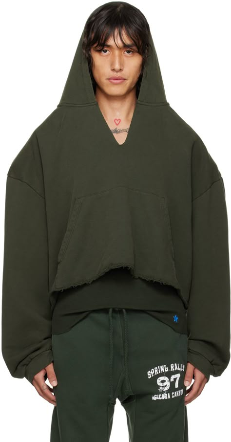 French terry hoodie. · Raw edge at V-neck and cropped hem · Kangaroo pocket · Padded dropped shoulders · Rib knit cuffs Wholesale exclusivity at SSENSE. Supplier color: Green Wocky Slush, Military Hoodie, Yeezy Fashion, Off White Hoodie, Knitted Hoodie, Aesthetic Outfits Men, Mock Neck Sweatshirt, Yellow Sweatshirt, French Terry Hoodie