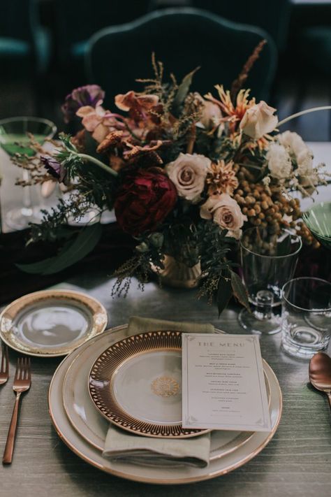 Sophisticated reception tablescape with metallic copper and gold details with moody and muted floral centerpiece | Image by Kindred Wedding Storytellers Vintage Wedding Cakes 1940s, Art Nouveau Wedding Centerpieces Table Decorations, Art Nouveau Centerpiece, Speakeasy Style Wedding, Moody Art Deco Wedding, 1920s Tablescape, Art Nouveau Wedding Decorations, Ypsilanti Freighthouse, Creative Wedding Centerpieces