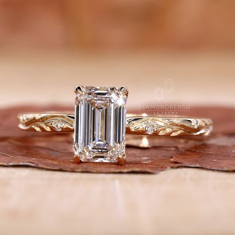 The Vintage Art Deco Diamond Ring blends modern workmanship's brightness with the grace of past design. Perfect for a statement piece, this vintage engagement ring boasts amazing diamonds. Its geometric designs and retro appeal help to distinguish the Art Deco engagement ring style. Perfect for individuals looking for everlasting beauty, the emerald cut diamond ring at the middle presents a sharp, refined appeal. Features of the Vintage Art Deco Diamond Ring: High-quality vintage diamond ring wi Retro Engagement Rings Art Deco, Vintage Emerald Cut Engagement Ring Art Deco, Emerald Cut Engagement Ring Art Deco, 1.5 Ct Emerald Engagement Ring, Emerald Cut Unique Engagement Ring, Dainty Emerald Cut Engagement Ring, Unique Band Engagement Ring, Vintage Emerald Cut Ring, Baguette Cut Engagement Ring