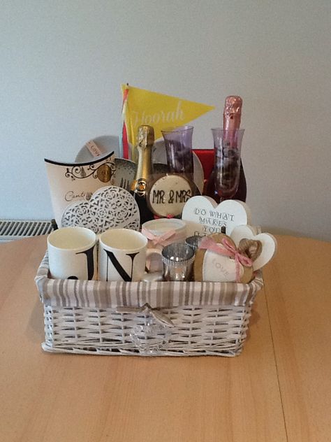 Couples wedding gift basket Couple Shower Gift Ideas, Gift Basket For Wedding Couple, Gift Basket For Couples, Wedding Gift Baskets For Bride And Groom, Creative Wedding Gift Basket For Couples, Gift Basket Ideas For Couples, Mr And Mrs Basket Gifts, Wedding Gift Basket, Male Gift Basket Ideas