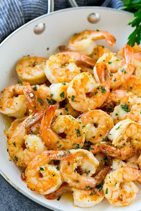 Shrimp in a skillet that are seared in garlic butter and sprinkled with parsley. Buttered Shrimp, Cooked Shrimp Recipes, Buttered Shrimp Recipe, Cooked Shrimp, Shrimp Dinner, Sauteed Shrimp, Garlic Butter Shrimp, Shrimp Recipes For Dinner, Butter Shrimp