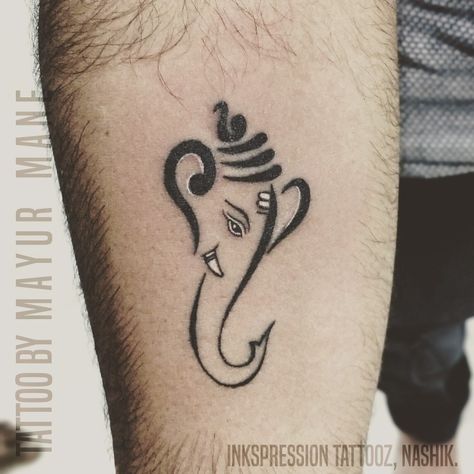 Small Lord Ganesha Tattoo. Lord Ganesha is the lord of New Beginnings, Prosperity & Remover of Obstacles. #inkspressiontattooz #getinked #ganeshatattoo #lordganesha #ganesha #smalltattoos #tattooedboys #tattooedmen #tattooaddict #nashiktattoos #tattoostudio #nashikgram #inkedboy #inkgram #inkstagram #lovefortattoos #lovetattoos #nashiktattoos #tattooinnashik #tattooshopinnashik #tattoostyle #besttattoo #besttattooinnashik Ganpati Tattoo On Neck, Vinayagar Tattoo Design, Small Ganesha Tattoo Design, Simple Ganesha Tattoo, Lord Ganesh Tattoo Designs, Ganapati Tattoo Design, Ganapati Tattoo, Small Ganesha Tattoo, Ganpati Tattoo Designs