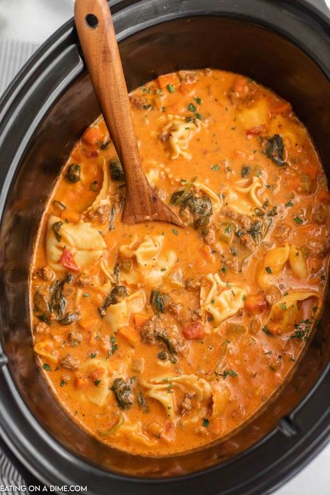 Crockpot Italian sausage tortellini soup recipe (& VIDEO!) Tortellini Soup Recipes Easy, Sausage Soup Crockpot, Tortellini Recipes Crockpot, Tortellini Soup Crockpot, Crockpot Italian Sausage, Sausage Crockpot Recipes, Italian Crockpot Recipes, Italian Sausage Tortellini, Italian Sausage Tortellini Soup