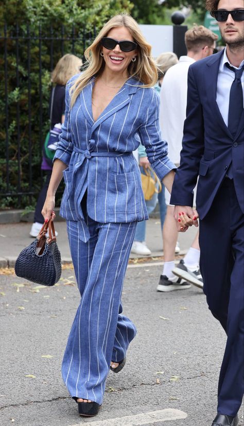 Sienna Miller wears a blue and white vertical striped Ralph Lauren suit that toes at the waist with black patent leather open toed platform heels and a navy blue woven handbag Wimbledon Style, Bubblegum Pink Dress, Wimbledon 2023, Sienna Miller Style, Black Platform Wedges, Wimbledon Fashion, Shoe Trend, London Kensington, Ideal Wardrobe