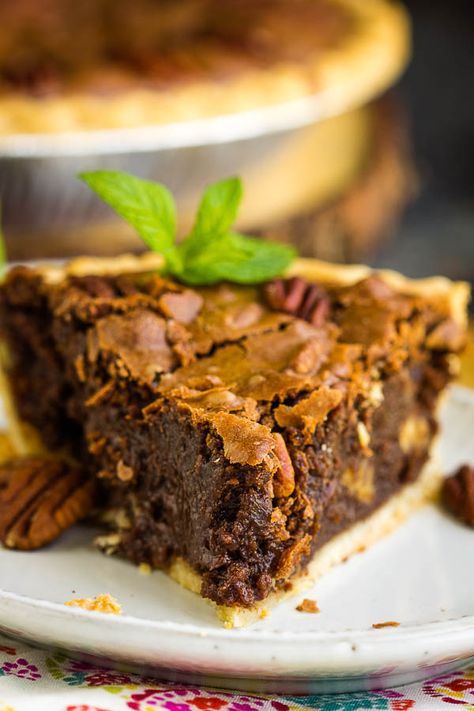 Rich, indulgent, and gooey, Chocolate Fudge Pecan Pie Recipe is quick and easy, requires no mixer, and has no corn syrup! It's a delicious new classic! #chocolate #fudge #pecan #pecanpie #chocolatepie #dessert #recipe Southern Chocolate Fudge Pecan Pie, Texas Pecan Fudge Pie, Southern Fudge Pecan Pie, Chocolate Pecan Pie Without Corn Syrup, Chocolate Fudge Pecan Pie, Fudge Pecan Pie Recipe, Pecan Pie Recipe No Corn Syrup, Pecan Pie Fudge Recipe, Fudge Pecan Pie