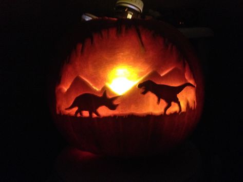 Dinosaur pumpkin! Dinosaur Jack O Lantern, Pumpkin Carving Dinosaur, Pumpkin Carving Ideas Dinosaur, Dino Pumpkin Carving Ideas, Volcano Pumpkin, Trex Pumpkin, Dinosaur Pumpkin Carving, Pumpkin Dinosaur, Dinosaur Pumpkin