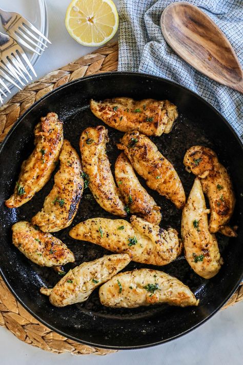 This SUPER yummy version of lemon pepper chicken tenders is a winner! Everyone loves a chicken tenderloin dinner recipe because they’re perfect for quick-cooking meals on busy weeknights. These homemade lemon pepper chicken strips are a fast, flavorful, easy one skillet recipe! It’s a chicken breast recipe that starts by seasoning and cooking slices, then tossing it in a rich lemon butter. The flavor is AMAZING, plus they’re a kid-friendly dinner that reheats perfectly as a lunch meal prep too. Lemon Pepper Chicken Tenders, Chicken Breast Strips Recipes, Easy Chicken Tenderloin Recipes, Lemon Pepper Chicken Breast, Baked Chicken Cutlets, Chicken Strip Recipes, Chicken Tenderloin, Chicken Tenderloin Recipes, Cooking Meals