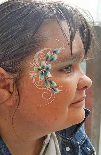 floral Eye Design Floral Face Painting, Floral Face Paint, Flower Face Paint, Market Painting, Face Painting Flowers, Eye Face Painting, Glitter Face Paint, Face Art Painting, Cheek Art