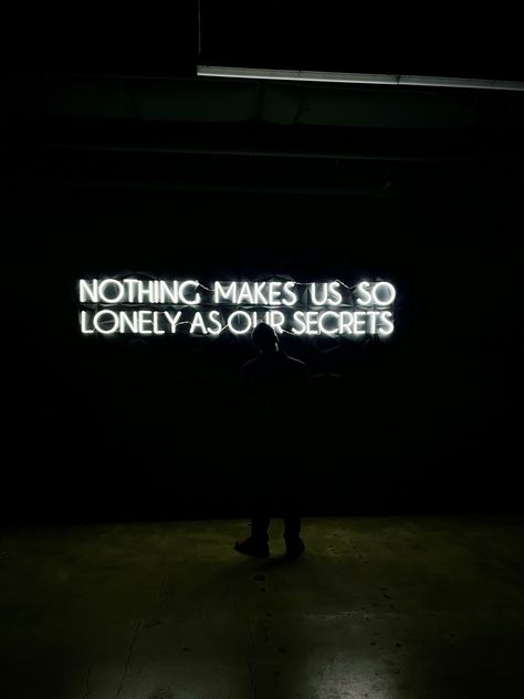 Quoted “nothing makes us so lonely as our secrets” with a man standing in front. Secret Keeper Aesthetic, Secret Spy Aesthetic, Quotes About Secrets, Secrets Aesthetic, Sinner Quotes, Secrets Quotes, Hiding Quotes, 2024 Books, Books 2024