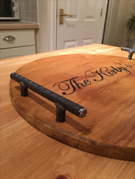 Wine barrel lid converted to a serving tray with custom made handles made from reinforcing bar Barrel Lids Ideas, Bourbon Barrel Lid Ideas, Whiskey Barrel Lid Ideas, Wine Barrel Garden, Whiskey Barrel Table, Wine Barrel Crafts, Barrel Art, Wine Barrel Bar, Money Making Projects