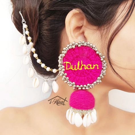 Items included: ❤️ Jhumka with Sahara ❤️ Mang teeka If you love your jewelry to have text in it, here's what you have been searching for 🔥 This Vibrant Pink Cowrie Set that says 'Dulhan' is so beautiful that you don't need any other jewellery items with it❤️ Text and colors can be customised 🔥 Visit indiashaat.com for more bridal jewelry options #indiashaat #textjewelry #namejewelry #pinkjewelry #cowriejewelry #shelljewelry [Handmade jewellery, jhumka, mang teeka, text jewelry, name j... Jewelry Text, Jewelry Name, Pink Jewelry, Shell Jewelry, Name Jewelry, Handmade Jewellery, Love Your, So Beautiful, If You Love