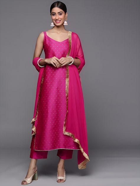 A beautiful women's kurta, trouser/pant, and dupatta set. The kurta showcases a graceful design with intricate patterns and embellishments. The matching trousers/pants are tailored for a comfortable fit, while the dupatta adds a touch of elegance with its complementary color and delicate detailing. This set is ideal for special occasions, offering a complete and stylish ensemble for women. Wedding Kurta Set For Women, Bandhani Straight Kurti Designs, Sleeveless Straight Kurti Designs, Straight Long Kurti Designs Party Wear, Straight Suits With Pants Indian, V Neck Salwar Designs, Straight Kurti Designs Party Wear, V Neck Sleeveless Kurti, Sleeveless Suits Indian