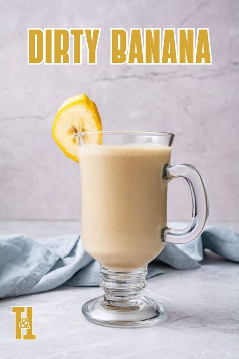 Escape to paradise with a Dirty Banana cocktail! This creamy, indulgent drink combines ripe bananas, rich chocolate liqueur, and a hint of rum for the perfect tropical treat. Banana Cocktail, Banana Cocktails, Liqueur Drinks, Banana Drinks, Cozy Drinks, Chocolate Liqueur, Rum Drinks, Halloween Cocktails, Fall Cocktails