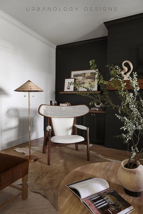 Our client loved interior design that has drama and a moody vibe. This corner sitting area we designed has that moody vibe with its dark color palette. The living room has a relaxed modernity, with the slightest of nods to mid-century mod. The rattan lamp is one of those ‘drama details’ that grabs your attention. See this whole interior design project at Urbanology Designs. We provide luxury interior design services world wide! Corner Sitting Area, Urbanology Designs, Rattan Interior, Moody Interior Design, Moody Modern, Moody Living Room, Country Modern Home, Country House Design, Living Room Interior Design