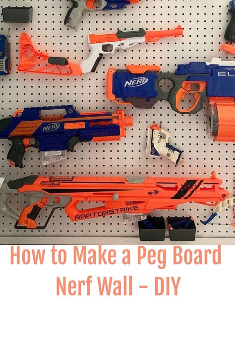 A pegboard displaying an arranged collection of colorful Nerf guns and accessories with text below reading "How to Make a Peg Board Nerf Wall – DIY". Peg Board Nerf Wall, Pegboard Baskets, Diy Peg Board, Nerf Storage, Peg Board Hooks, Peg Wall, Nerf Toys, Cases Diy, Peg Board