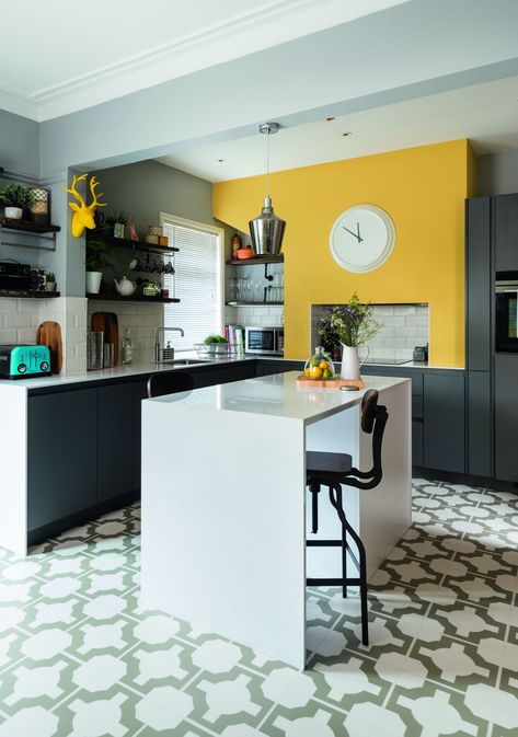 Want to incorporate #colour into your #kitchen? We love this combination of #classic #greys with a pop of #sunny #yellow. For more #colourful #kitchen #inspiration, take a look at our feature. Mustard Kitchen, Yellow Kitchen Walls, Kitchen Feature Wall, Kitchen Feature, Colourful Kitchen, Kitchen Design Color, Kitchen Walls, Kitchen Colour Schemes, Yellow Kitchen