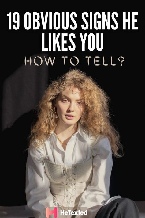 A young blonde woman with curly hair is sitting on a black studio. She is wearing a white shirt and has a serious expression on her face. How To Know Someone Like You, How To Tell If He Likes You, He Likes You, How To Know If Someone Like You, Does He Like You, Heart Diet, Soulmate Connection, A Guy Like You, The Way He Looks