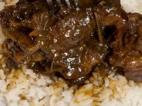 Southern Smothered Oxtails Recipe - Whisk Southern Oxtails Soul Food Stovetop, Oxtail Recipes Southern Oven, Oxtail Recipes Southern, Smothered Oxtails And Gravy, Oxtails Recipes Southern, Southern Oxtails Soul Food, Oxtails And Rice, Smothered Oxtails, Oxtail Recipes Easy