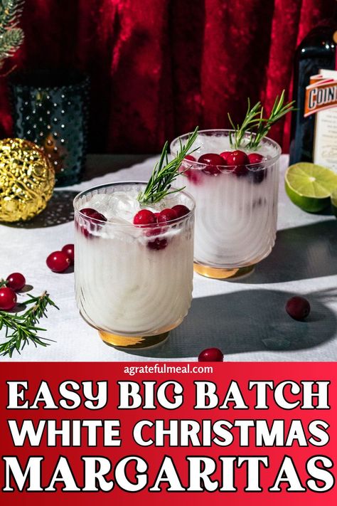 These white Christmas margaritas are perfect for one or a crowd, making it perfect for Holiday or Christmas parties. Made with coconut tequila, Cointreau triple sec, lime juice, and cream of coconut, they are creamy and delicious. They're the perfect festive drink recipe for the holiday season. Whether you're hosting a holiday party or just want a festive cocktail at home, these white Christmas margaritas are sure to be a hit. You can even serve these as a Thanksgiving or New Years cocktail! Batch Christmas Cocktail, Christmas Margaritas, Holiday Vodka Cocktails, New Years Cocktail, Holiday Margaritas, Coconut Tequila, New Years Eve Drinks, Paloma Recipe, Cranberry Margarita