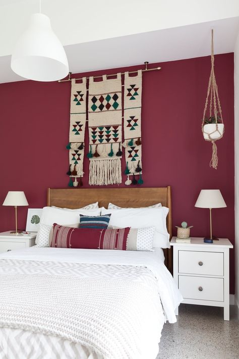 A Colorful, Globally Eclectic Toronto Apartment Red Bedroom Walls, Toronto Apartment, White Wall Bedroom, Calming Bedroom, Deco Studio, Interior Color Schemes, Apartment House, Accent Wall Bedroom, Eclectic Bedroom