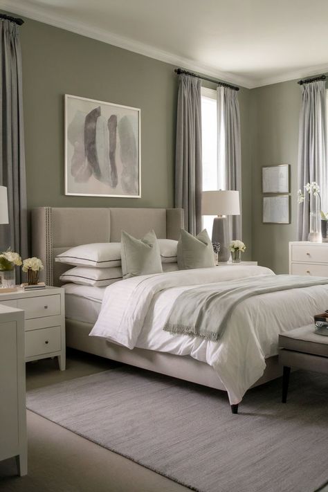 A sophisticated bedroom with a blend of grey, white, and sage green tones for a chic look. Sage Green Bedroom Grey Bed, Sage Green Bedroom White Furniture, Gray And Sage Green Bedroom, Sage And Cream Bedroom, Sage Green And Gray Bedroom, White And Sage Green Bedroom, Sage Green And White Bedroom, Sage Green Room Ideas, Grey And Green Bedroom