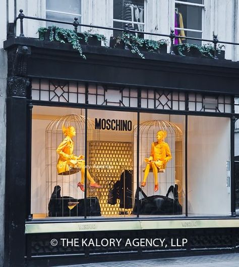 Picture of the exterior window of the Moschino store in Mayfair ... Moschino Window Display, Sage Paint Color, Storefront Display, Fashion Window Display, Retail Facade, Exterior Window, Clothing Store Design, Store Design Boutique, Window Display Design