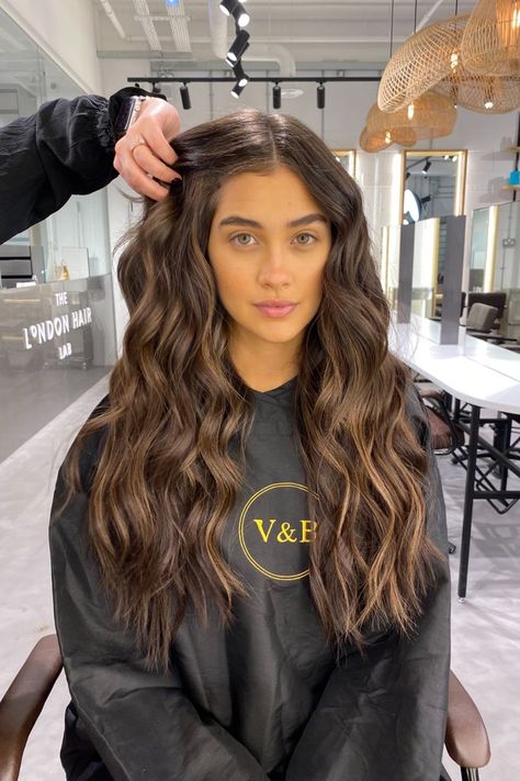 Highlighted Brunette hair in London salon Glossy Brunette Balayage, Natural Balayage Hair Brunette, Hair Extensions Long Brown, Brunette Hair Before And After, Lifted Brown Hair, Long Brown Hair With Extensions, Virgin Brunette Hair, Enhanced Brunette Hair, Extensions Hair Brown