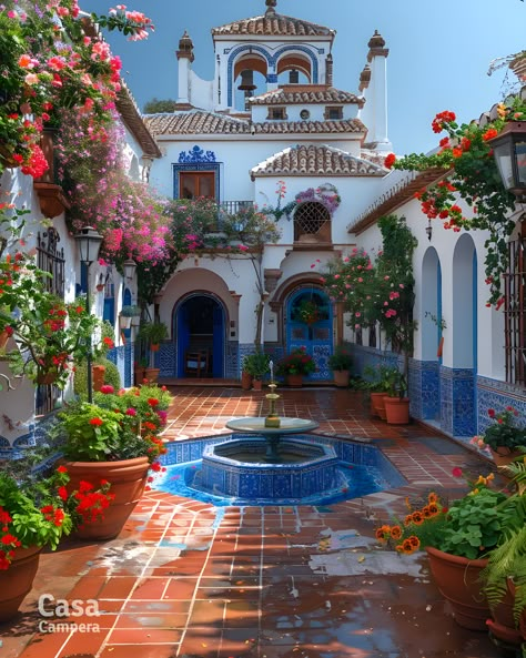 Step into elegance with this Spanish patio showcasing a beautiful mosaic fountain and lush greenery. The intricate tile work and blooming flowers create a picturesque setting. Follow CasaCampera for inspiring patio designs! Spanish Patio Ideas, Spanish Style Patio, Spanish Backyard, Spanish Mosaic, Spanish Style Courtyard, Spanish Gardens, Mexican Courtyard, Spanish Patio, Mosaic Fountain