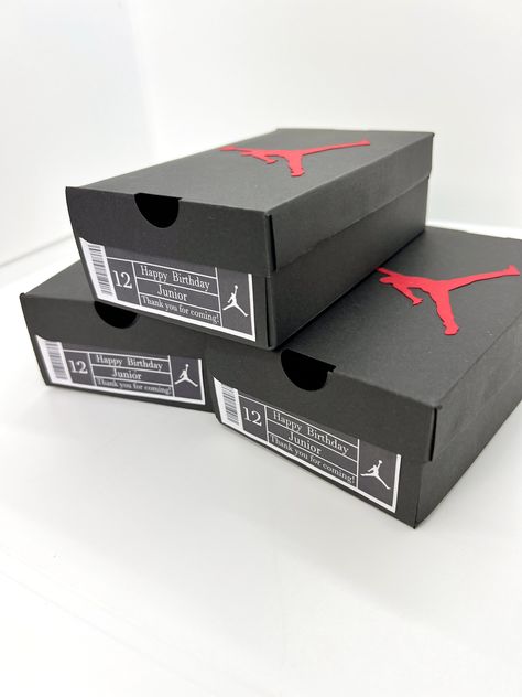 Mini Jordan shoebox party favor boxes. Perfect for a sneaker themed party! Each box is 5.25" Length 3.25 Wide and 1.85" Tall. Box is completely made from quality cardstock and embellished with a custom shoebox label and Jumpman image **Boxes are sold fully assembled** Please add Name, age and/or message you would like on the shoe box label Jordan Shoe Box Party Favor, Mini Jordan Shoe Boxes, Sneaker Themed Party, Jordan Shoe Cake, Jordan Shoe Box, Sneaker Party, Jordan Gift, Jordan Baby Shower, Camp Birthday