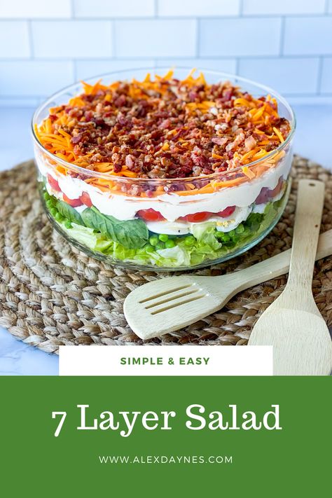 This traditional seven-layer salad is an easy recipe is a potluck specialty. It’s great for feeding a crowd and it’s high protein since it is loaded with cheese, bacon, and eggs. The creamy homemade dressing has an amazing flavor. It’s a great make-ahead recipe! This 7 layer salad perfect for parties, picnics, and potlucks. I love making this recipe during the summer months too! Make it with me! 7layer Salad, 7 Layer Salad Recipe, 7 Layer Salad, Layer Salad, Seven Layer Salad, Layered Salad Recipes, Recipes Salads, Pork Chop Recipes Baked, Trifle Dish