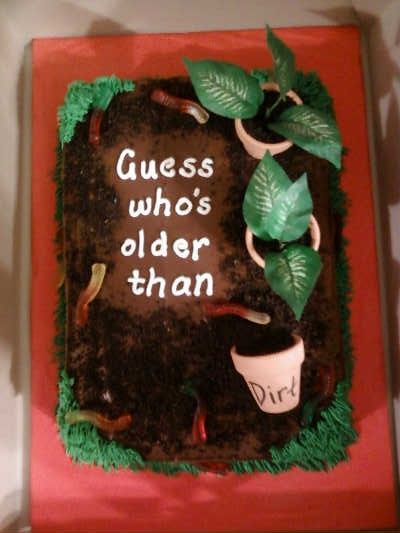 I like the use of the cup and leaves to bring together the "dirt" outside kind of look. Older Than Dirt Cupcakes, Dirt Cake Decorating Ideas, Dirt Cake For Earth Day, Edible Dirt For Cakes, Dirt Cake Dessert, Older Than Dirt Cake, Old As Dirt Cake Birthdays, Dirt Cakes, Chocolate Dirt Cake