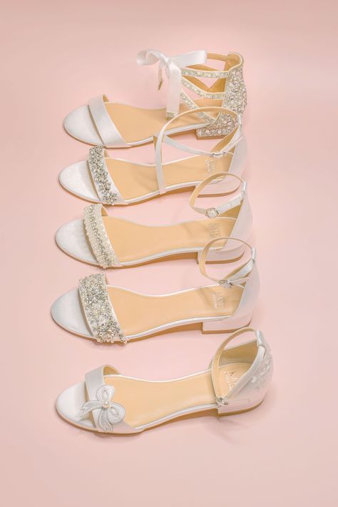 Looking for the perfect wedding flats are comfortable? Say hello to our newest embellished bridal flat shoes, Camila! Made with amazing jewel details on the finest bridal ivory satin... Did we mention, Camila was designed for modern brides who adore style and comfort! Style “Camila” in bridal ivory (Our bridal ivory is designed to match most wedding dress color except diamond white.) Wedding Flats 1/2" flat heel Adjustable strap with tie closure for secure fit Embellished Jewel wedding shoes Siz Flat Wedding Shoes For Bride Jj'shouse, Elegant White Flat Wedding Shoes, Festive Flat White Wedding Shoes, Spring Lace Flat Heel Wedding Shoes, White Embellished Flat Heel Wedding Shoes, Bridal Shoes Flats Sandals, Silver Bridesmaid Shoes, Gold Bridesmaid Shoes, Wedding Flats For Bride