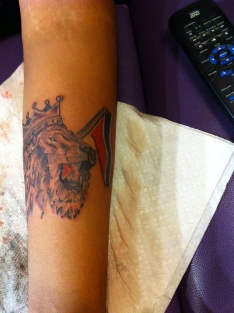 Lion of Judah With The Trinidad Flag done By Aga Trinidad Flag, Trinidad And Tobago Flag, Flag Tattoo, Lion Of Judah, Leaf Tattoos, Trinidad, Maple Leaf Tattoo, Trinidad And Tobago, I Tattoo