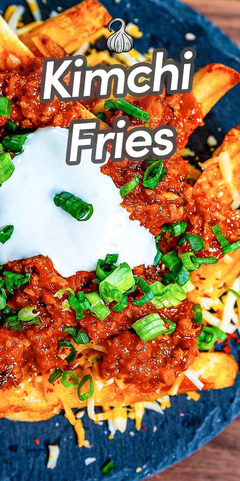 Experience crispy, vegetarian Korean Kimchi Fries, loaded with gooey cheese and caramelized kimchi topping mix. You'll never eat fries the same way again. Kimchi Fries Recipe, Kimchi Fries, Kim Chee, Korean Chili Powder, Cooking Torch, Korean Kimchi, Korean Side Dishes, Crispy Fry, Fries Recipe