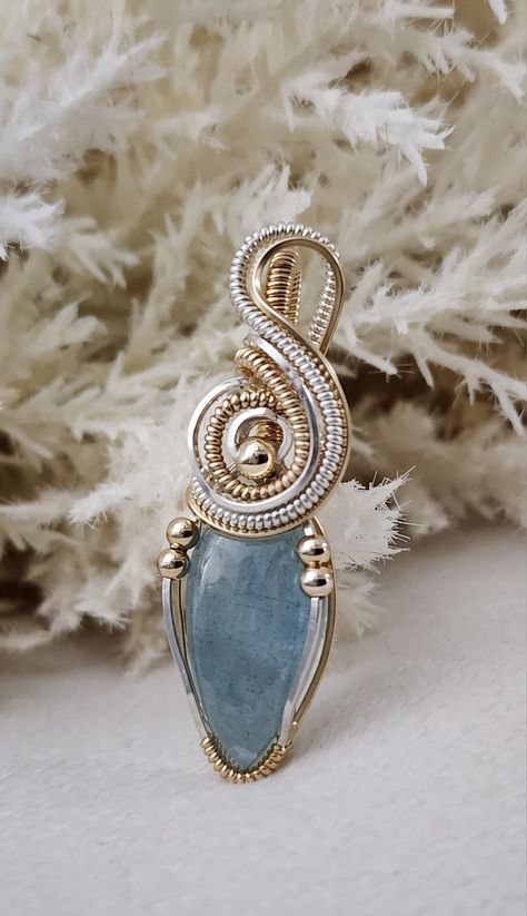 Teardrop Shaped Aquamarine cabochon wrapped in sterling silver and 14/20 yellow gold-filled wire and beads Diy Wire Pendant, Aquamarine Cabochon, Aquamarine Pendant, Wrap Ideas, Wire Work Jewelry, Wire Pendant, Bracelets Diy, Work Jewelry, Beaded Bracelets Diy