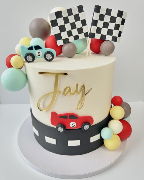 Race Car Themed 5th Birthday Cake 🏁🏎️ @thecottagemarket helping me out with a quick turnaround on the acrylic name charm! Thank you!! #customcake #customcakes #buttercreamcakes #buttercreamcake #buttercream #fondantdecoration #cake #birthdaycake #racecarcake #racecars #racecar #cakedecorating #cakedesign #cakeart #cakedecorator #cakedesigner #cakeartist #fifthbirthday #baker #njbaker #njcakes #njdesserts Car 2nd Birthday Cake, Car Themed Birthday Party Cake, Car Cakes For Boys Birthday For Kids, 2 Fast Cake, Car Theme Cake For Kids, Fast One Birthday Cake, Cake Race Car, Vintage Race Car Cake, Race Cars Cake