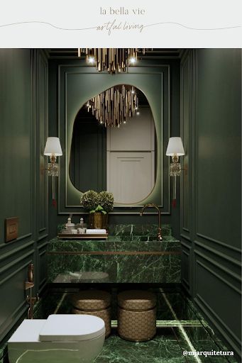 Green is in and this bathroom was designed with only green in mind! From wall paint to marble countertops, this green bathroom is a dream for anyone who loves the color and wants to be surrounded by it. Adding gold accents and using organic shapes for things like the mirror bring the room together with ease. Bathroom Inspo Green, Organic Shaped Mirror, Bohemian Restaurant, French Style Interior Design, Green Marble Bathroom, Classical Bathroom, French Style Interior, Restroom Design, Shaped Mirror