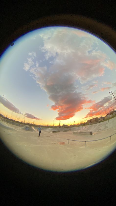 Pastel sunset with fluffy clouds and skatepark taken with a fish-eye lens Fish Eye Pfp Aesthetic, Fish Eye Wallpaper, Fish Bowl Pfp, Fish Eye Aesthetic, Skatepark Aesthetic, Fish Eye Lens Aesthetic, Fish Eye Pfp, Fisheye Pfp, Autumn Wallpaper Hd