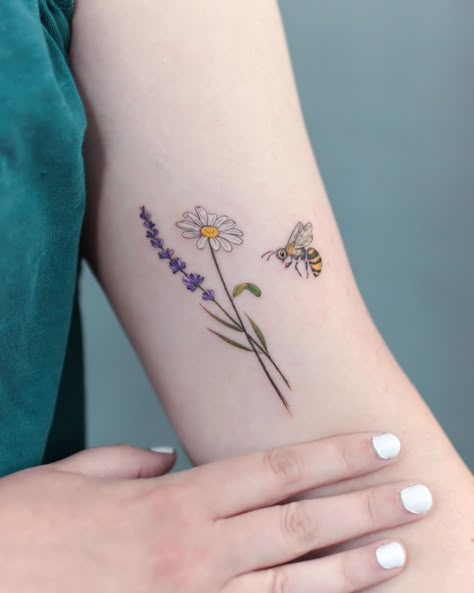 25 Birth Flower Tattoos That Celebrate Each Month of the Year | Parenting Questions | Mamas Uncut Cactus Tattoos, Tattoos For Moms With Kids, Tattoos Nature, Red Tattoo Ideas, Tattoos For Moms, November Aesthetic, May Birth Flowers, Tattoos Cool, Tattoos Matching