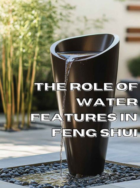 A modern metal garden fountain with a tall, thin water spout in a zen garden setting, surrounded by smooth stones and bamboo plants, illustrating the role of water features in Feng Shui. Feng Shui Fountain, Zen Fountain, Fountain Outdoor, Feng Shui Energy, Outdoor Fountains, Home Gardens, Fountains Outdoor, Garden Fountains, Energy Flow