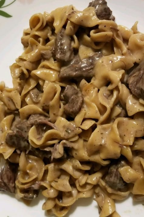 This instant pot beef stroganoff is a quick and easy beef stroganoff recipe! Cook the best instant pot beef recipe using beef stew meat, mushrooms, egg noodles, and sour cream. You will love cooking this beef stroganoff recipe for an easy dinner! Instant Pot Beef Stroganoff Stew Meat Cream Of Mushroom Soup, Instant Pot Beef Stroganoff Easy, Instant Pot Stroganoff Stew Meat, Insta Pot Beef Stroganoff Recipe, Instant Pot Beef Stroganoff With Cream Of Mushroom Soup, Beef Stroganoff Pressure Cooker, Insta Pot Beef Stroganoff Easy, Beef And Noodles Instant Pot Stew Meat, Beef Stew Meat Stroganoff