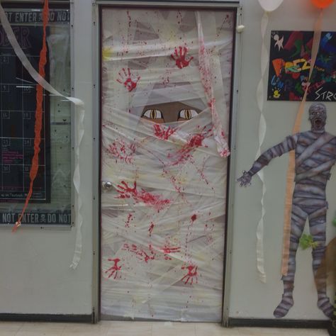 DIY Halloween Decorated Door. #mummy #scary #decorations #school #toiletpaper Dorm Door, Scary Decorations, Diy Halloween, Halloween Diy, Door Decorations, Halloween Decorations, Halloween, Art, Halloween Crafts