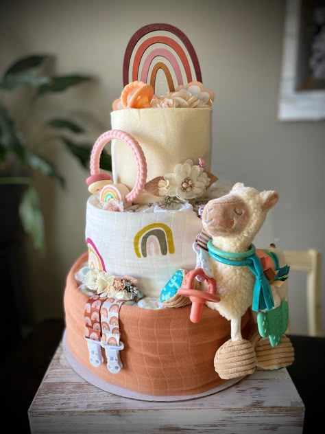 Nappie Cake Ideas, Nappy Cake Ideas Diy Girl, Diaper Cake Alternative, How To Diaper Cake, Baby Shower Diaper Cake For Girl, Diaper Cake Ideas Girl, Neutral Diaper Cake Ideas, Boho Diaper Cake Boy, Gender Neutral Diaper Cake Ideas