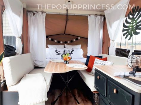 Manda took a tired old 1988 Starcraft Starblazer and gave it a little extra TLC. The result is a space that looks as gorgeous as any modern pop up camper. 70s Pop Up Camper Remodel, Pop Up Camper Remodel Black, Pop Up Camper Before And After, Black Pop Up Camper, Diy Pop Up Camper Remodel Color Schemes, Viking Pop Up Camper Remodel, Redone Pop Up Camper, Pop Up Camper Table Makeover, Pop Up Camper Clothes Storage