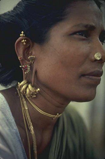 India |  Portrait of a village woman, with her lovely jewellery.  Photo taken in Madurai, Tamil Nadu. | Photographer unknown Creative Rings, Rings Boho, Dr Shoes, Body Modification, Indian Woman, Indian Aesthetic, Long History, Madurai, Ear Rings